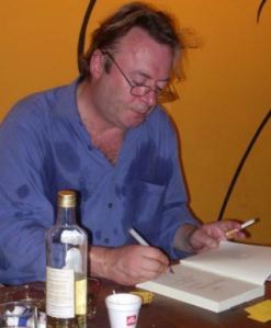 Atheist Christopher Hitchens Signing A Copy Of His Book God Is Not Great For God